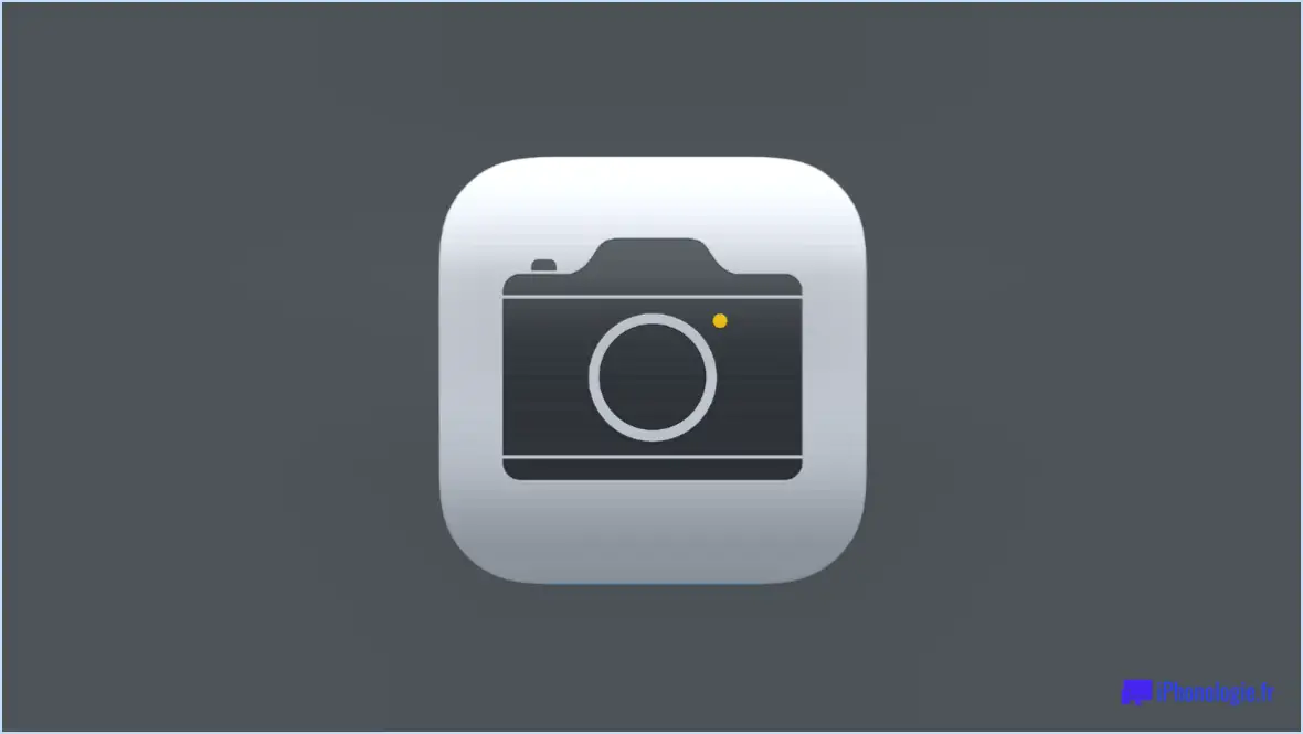 Pourquoi y a-t-il un point jaune sur l'icône de l'appareil photo de mon iPhone?
