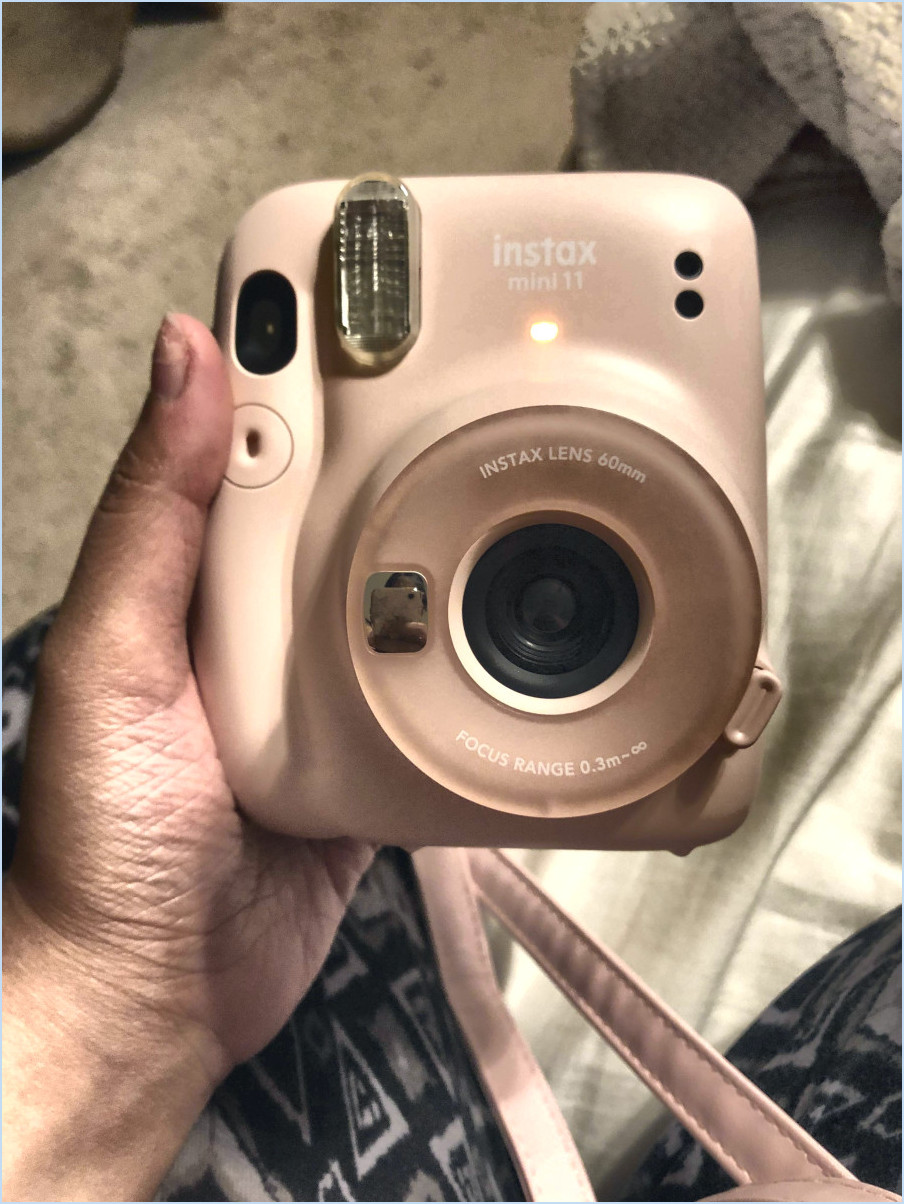 Que signifie la lumière orange sur l'instax mini 11?