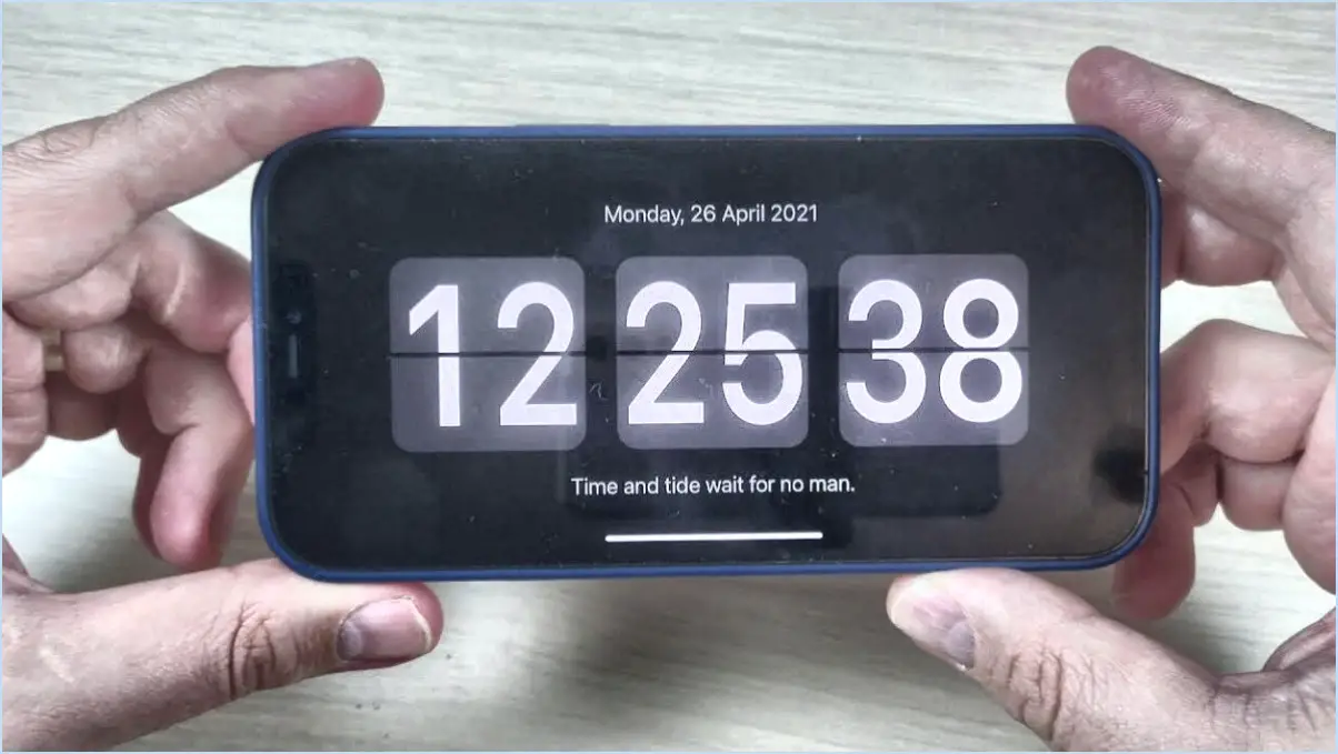 Comment mettre l'horloge sur l'écran de verrouillage de l'iphone?